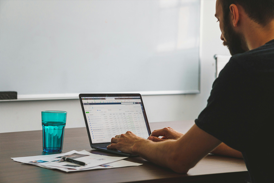 Strategist reviewing data dashboards for film marketing performance and future growth planning.