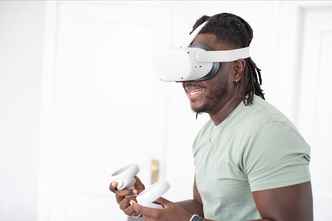 A person engaging with an AR/VR headset playing a branded game